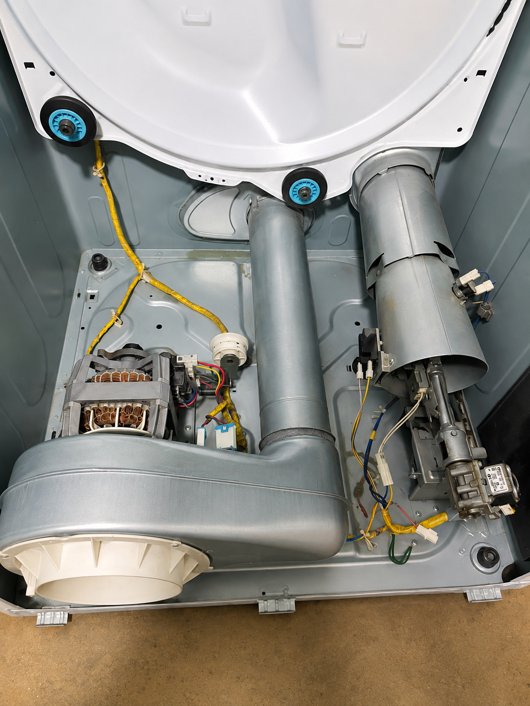 Kenmore 402-99032010 dryer interior disassembled — blower housing, motor, and gas valve assembly visible — Highlands, Denver