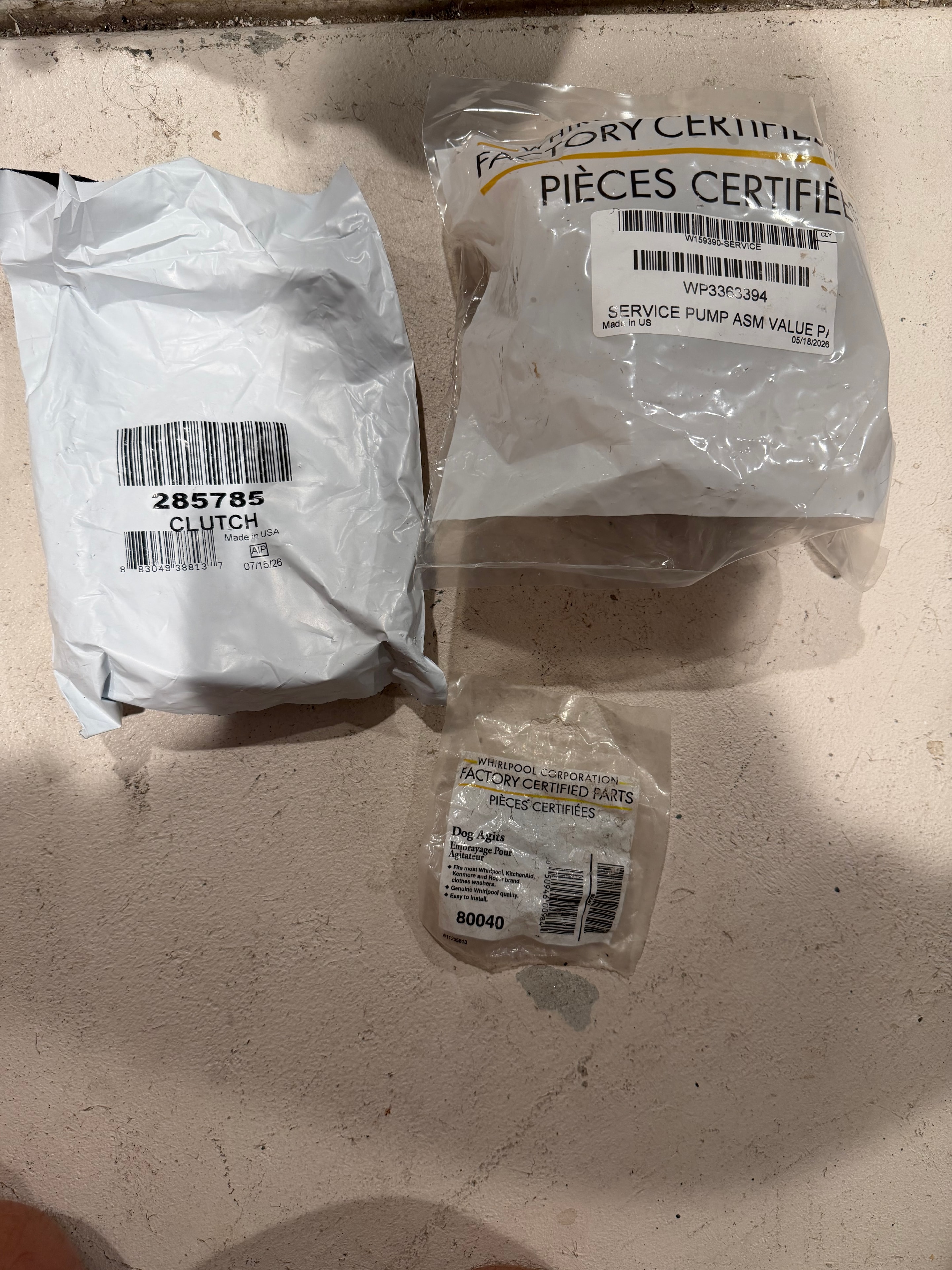 Whirlpool washer replacement clutch 285785 and drain pump WP3363394